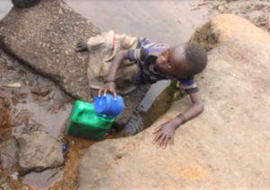 A child sitting on the ground